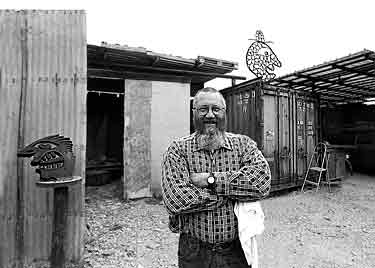 Mark Bulwinkle, photograph of the artist at his studio in west Oakland, CA 1997.